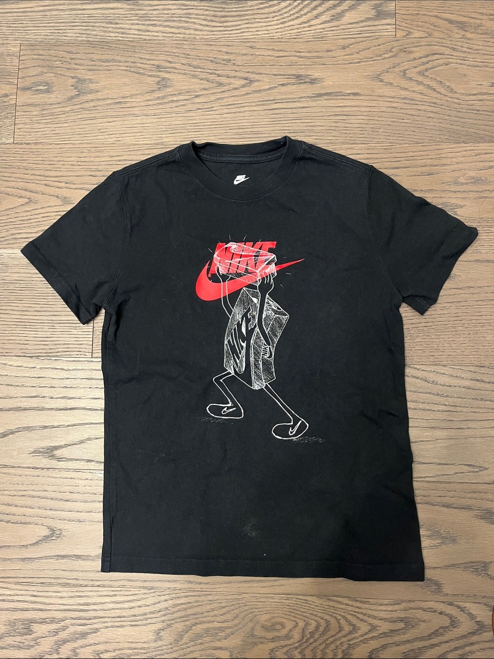Nike Black Short Sleeve T-Shirt with Red Swoosh Graphic